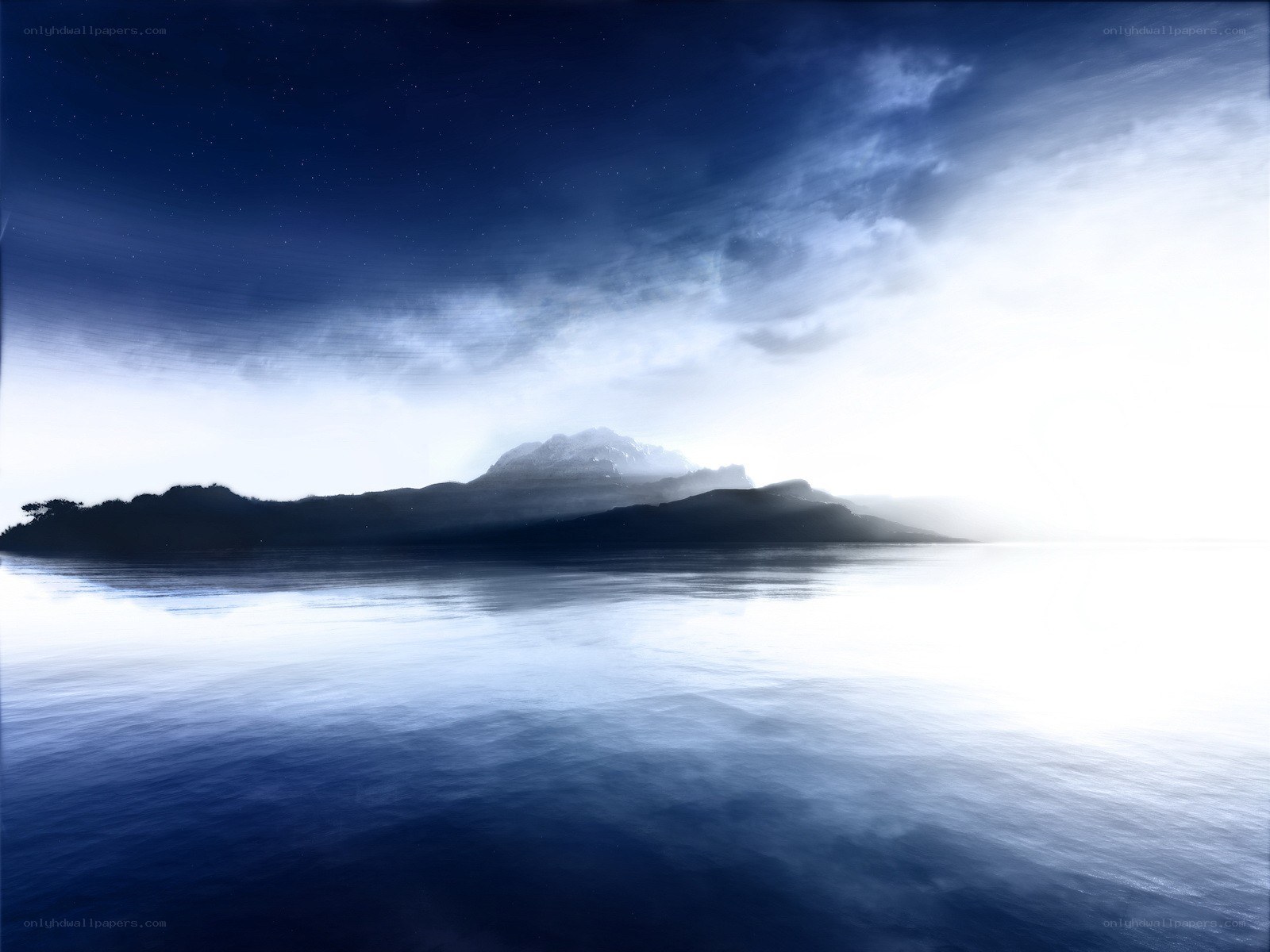 Island at dawn in mist