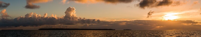 Island at Sunset — Orange, Serene, Photograph, Ocean