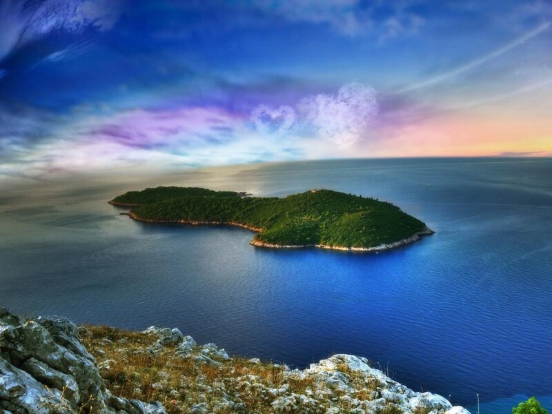 Island at sunset with colorful sky