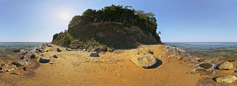 Island beach with rocks and trees
