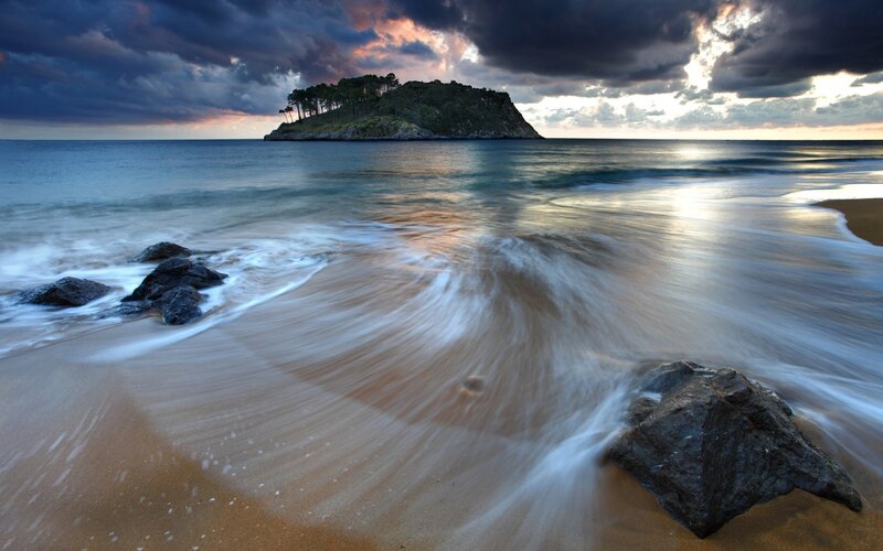 Island in Ocean at Sunset — Blue, Dramatic, Photograph, Beach