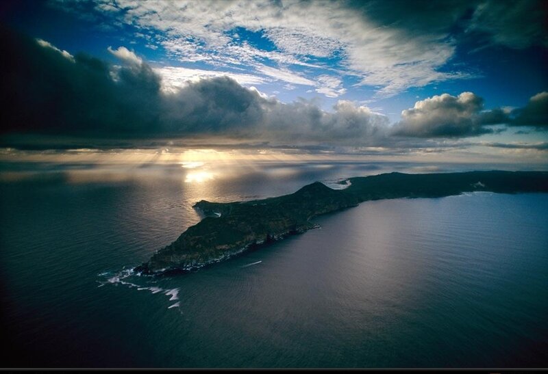 Island in Ocean at Sunset — Blue