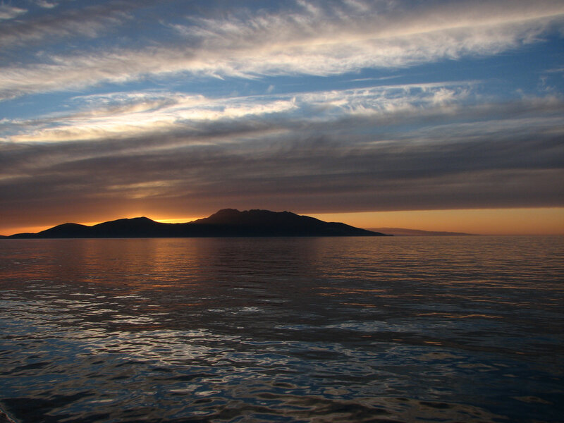 Island Silhouette at Sunset — Blue