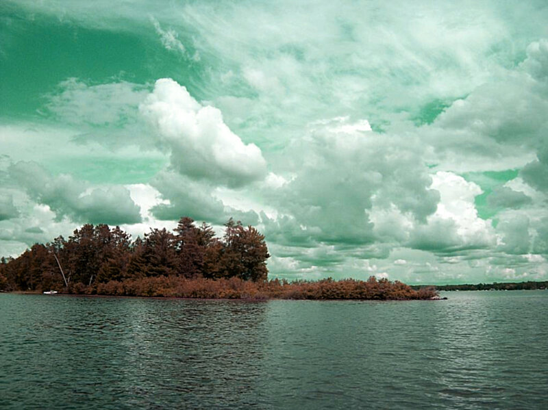 Island under cloudy sky