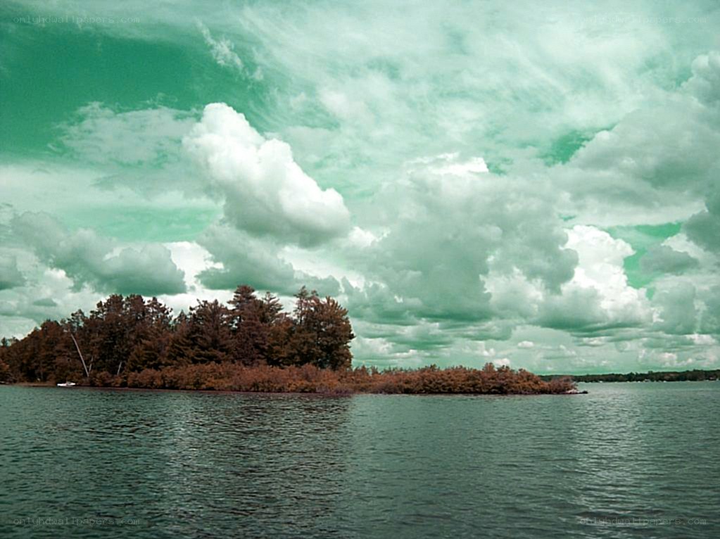Island under cloudy sky