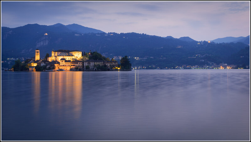 Island with Buildings at Dusk