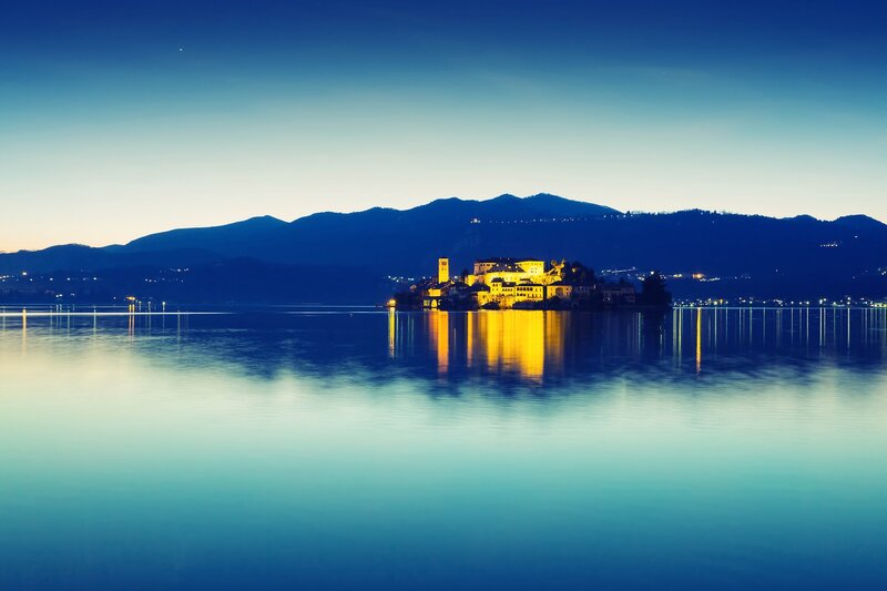 Island with Illuminated Buildings — Blue, Serene