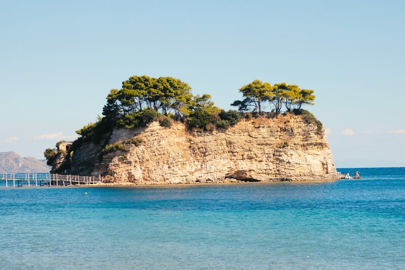 Island with trees and pier