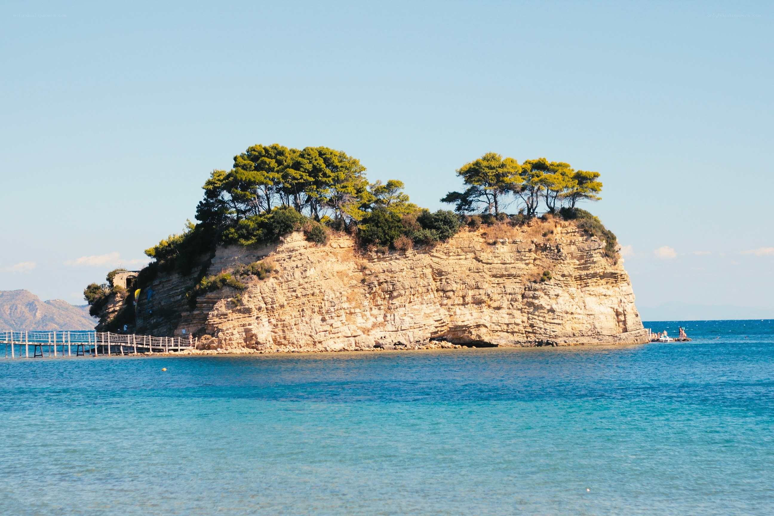 Island with trees and pier
