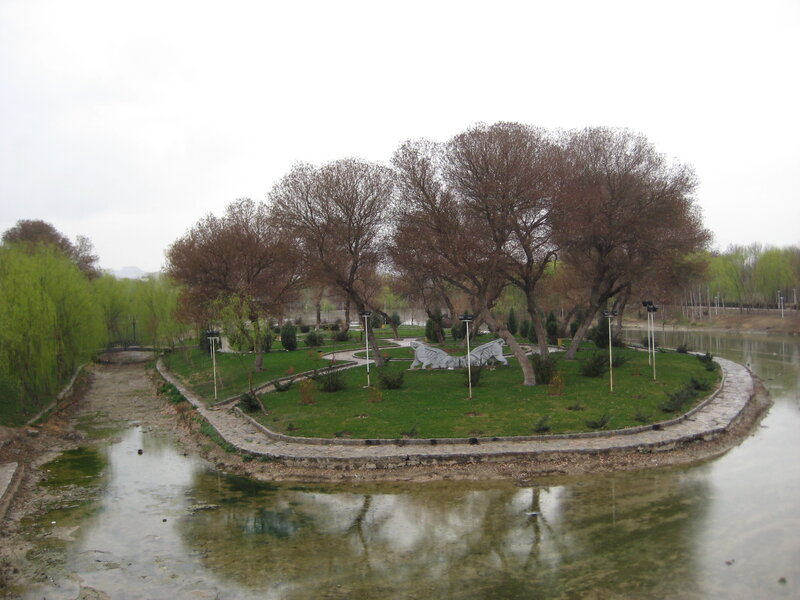 Island with Trees and Sculptures