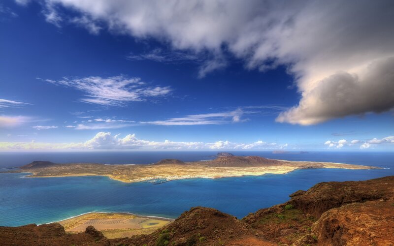 Island with Volcanic Hills — Blue
