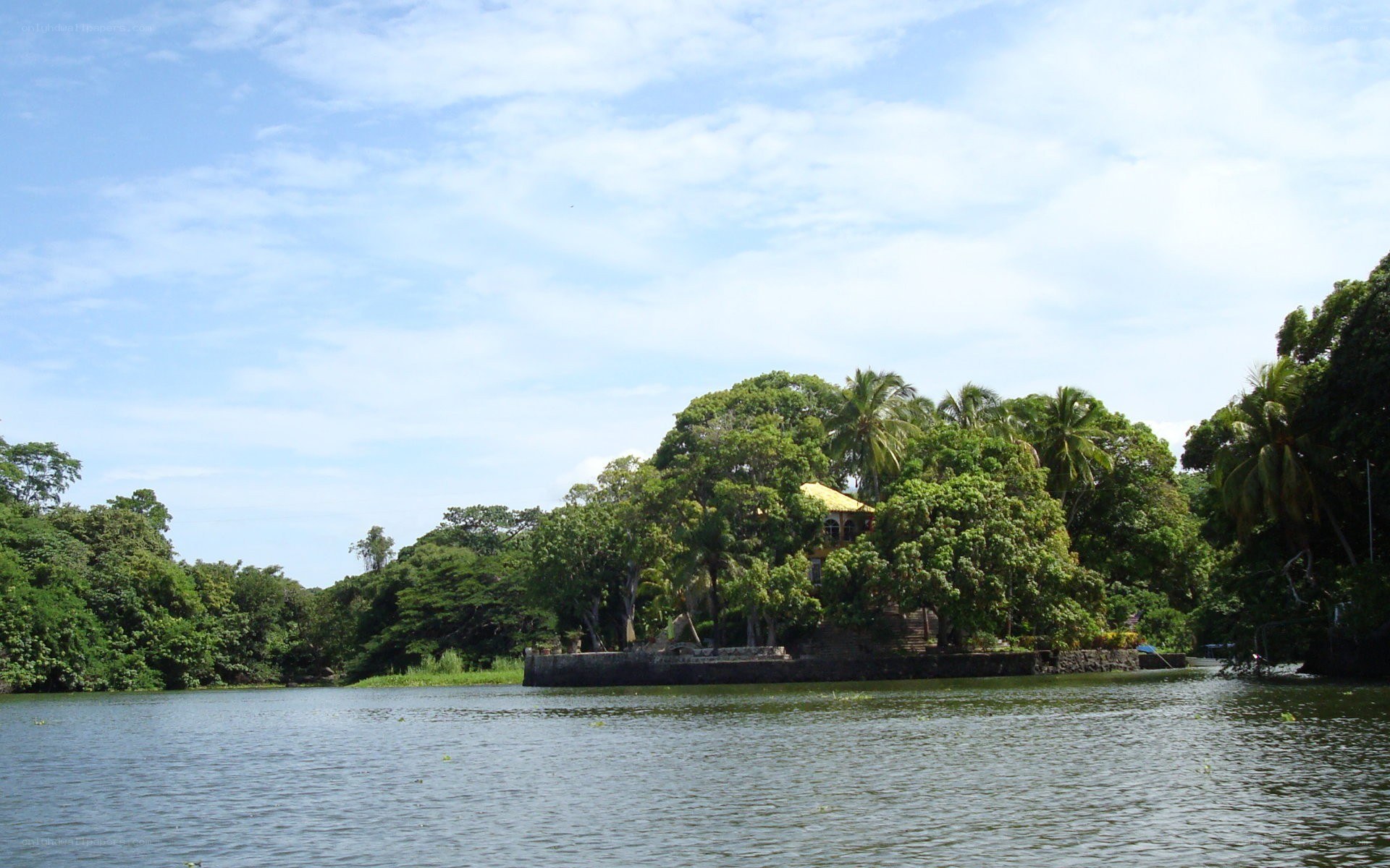 Island with yellow-roofed building