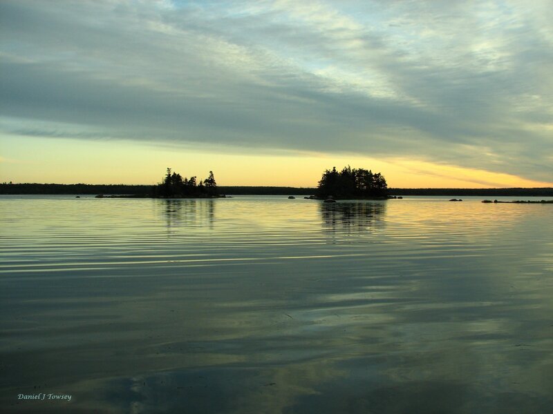 Islands at sunset on a calm lake