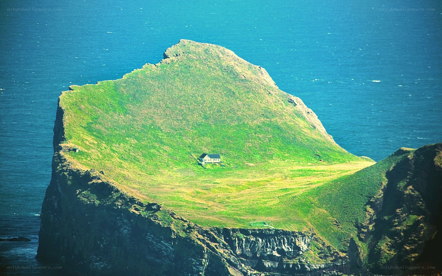 Isolated house on a green island