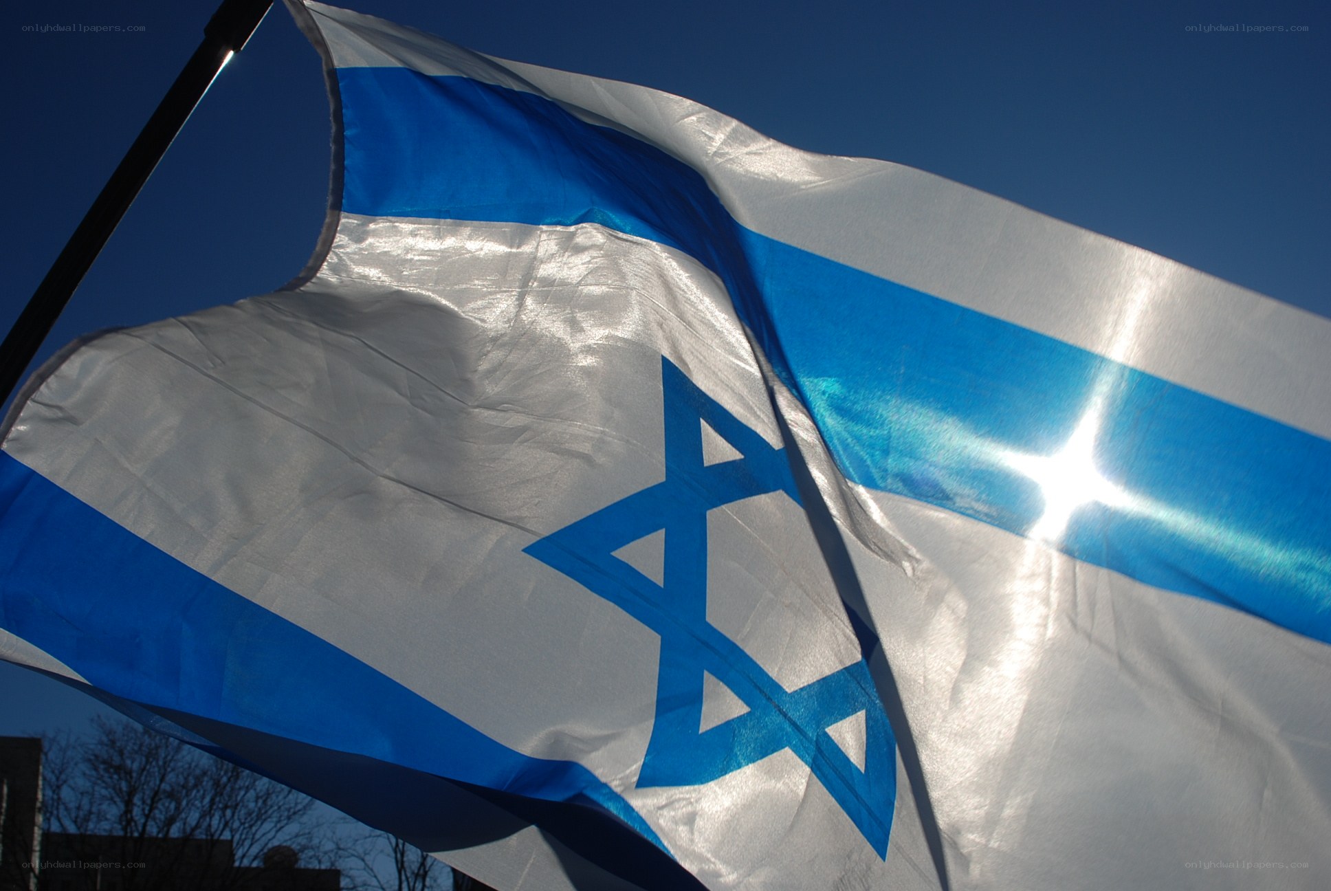 Israeli flag waving in wind