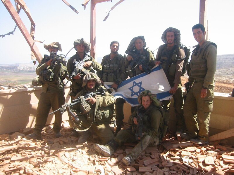 Israeli soldiers with flag
