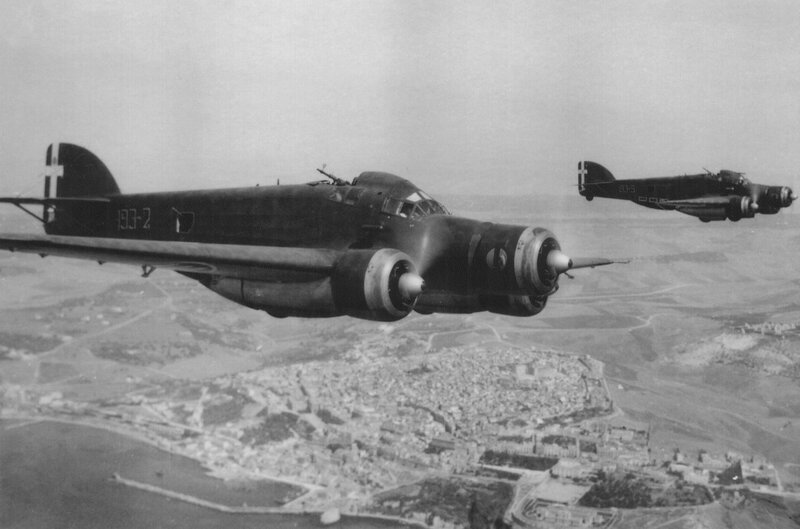 Italian bombers over a coastal town