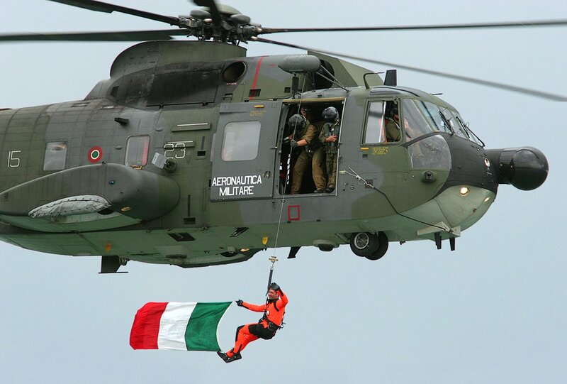 Italian military helicopter with paratrooper