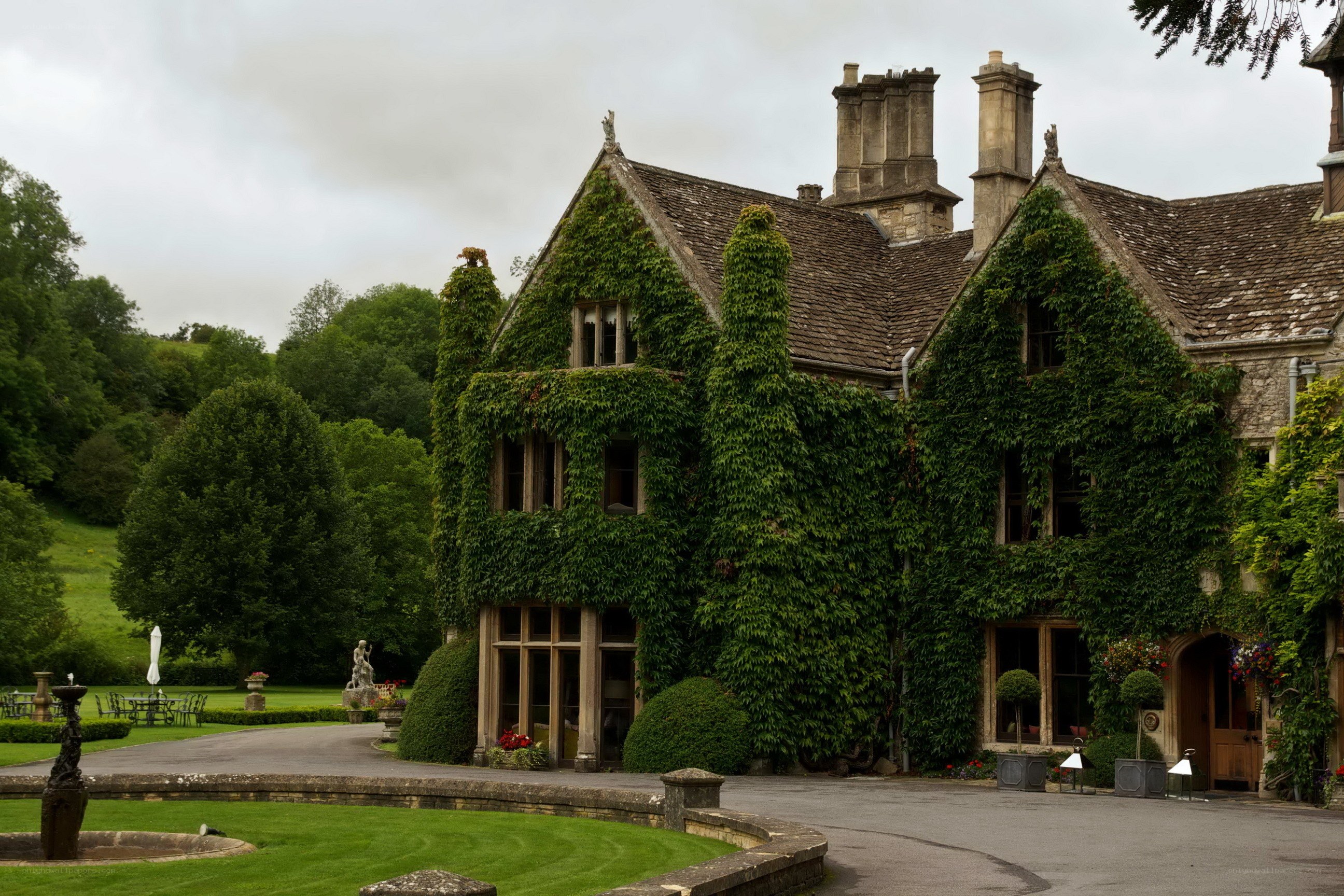 ivied manor house in countryside