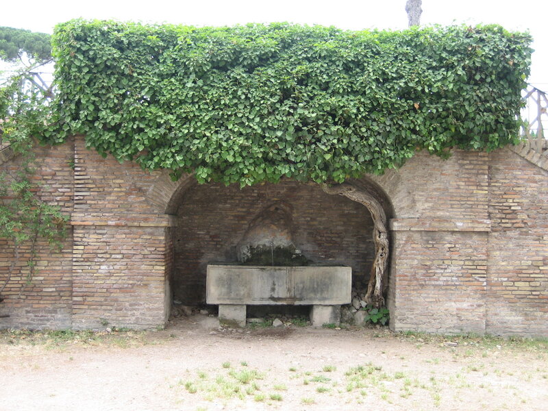 ivy-covered fountain alcove