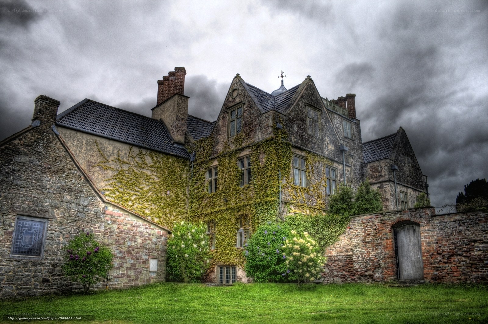 Ivy-covered stone manor house