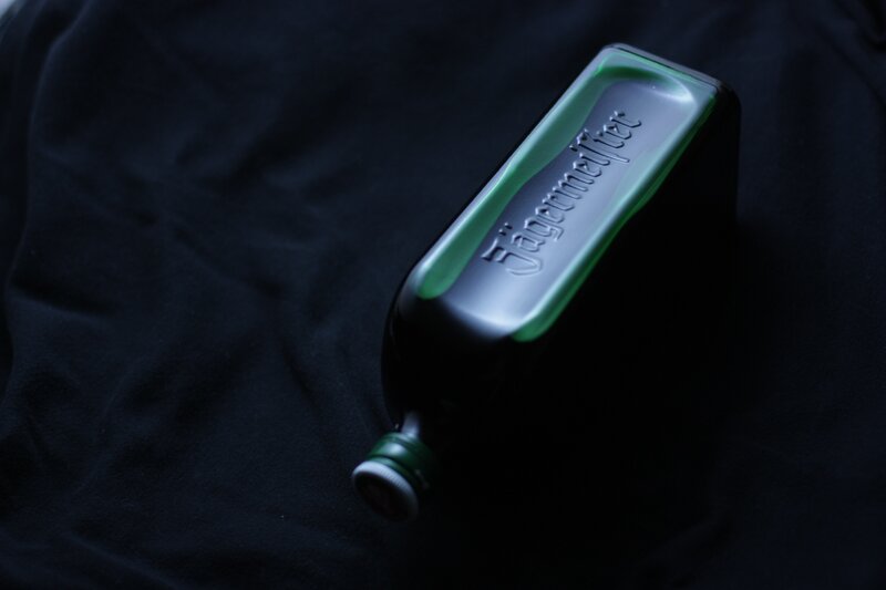 Jägermeister bottle on black cloth
