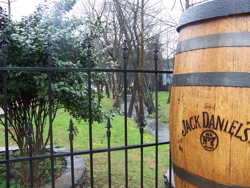 Jack Daniel's barrel by a fence