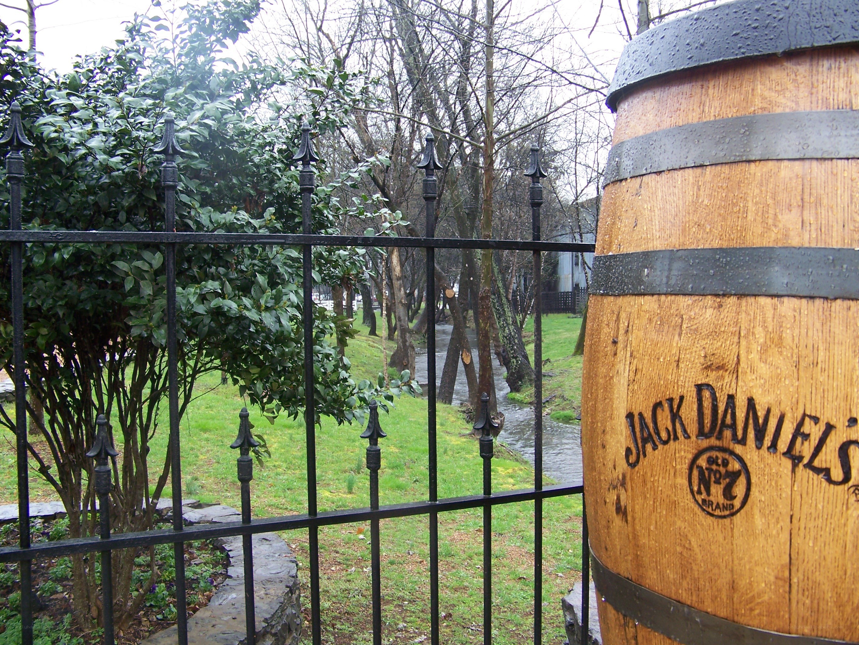 Jack Daniel's barrel by a fence