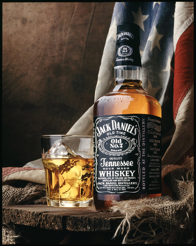 Jack Daniel's whiskey bottle and glass