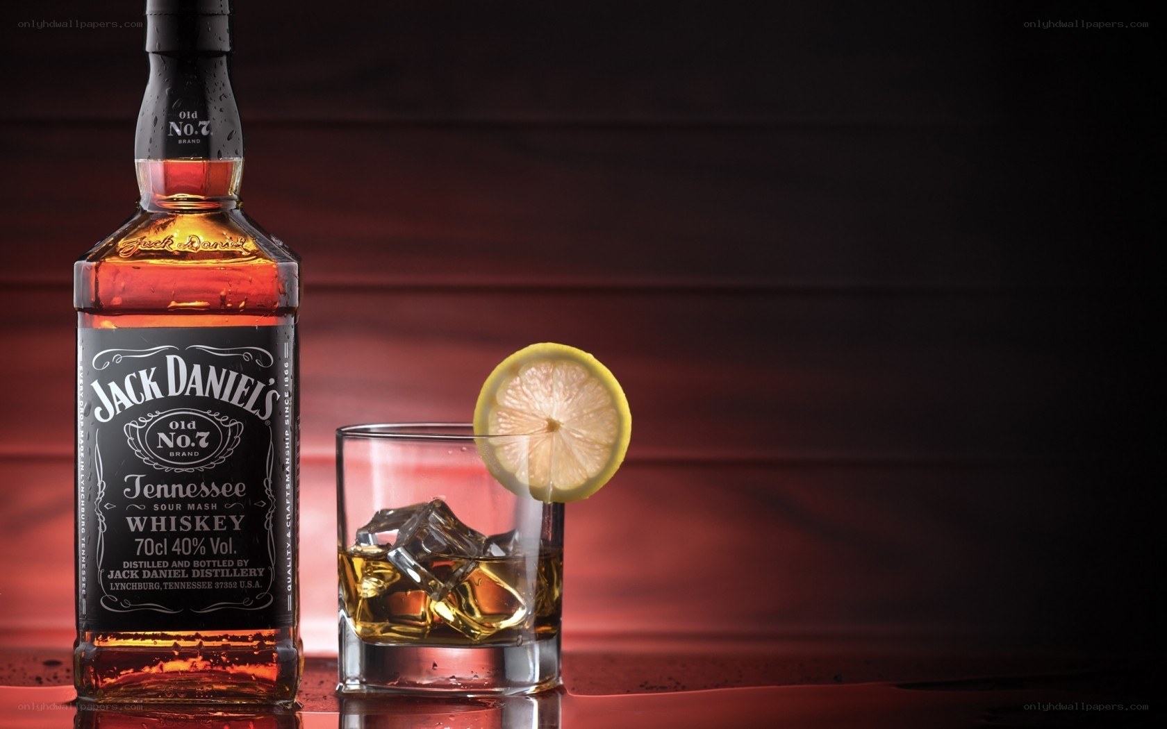 Jack Daniel's whiskey bottle and glass