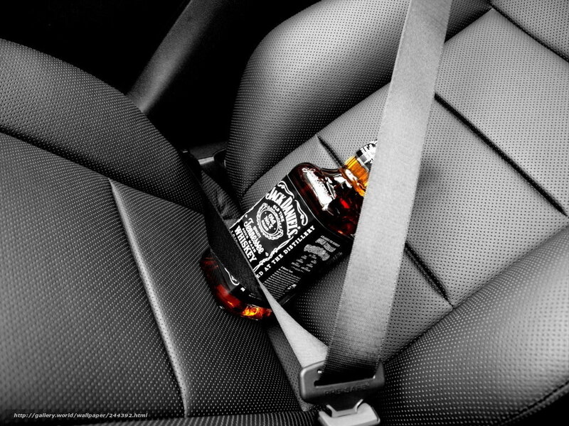 Jack Daniels bottle in car seat