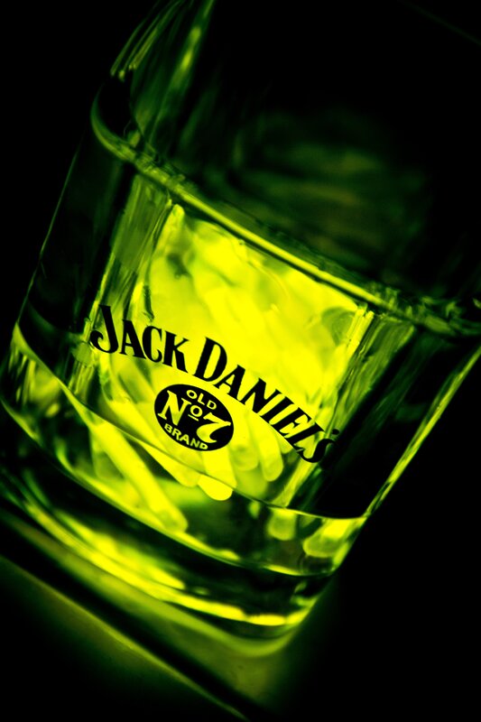 Jack Daniels glass with green light