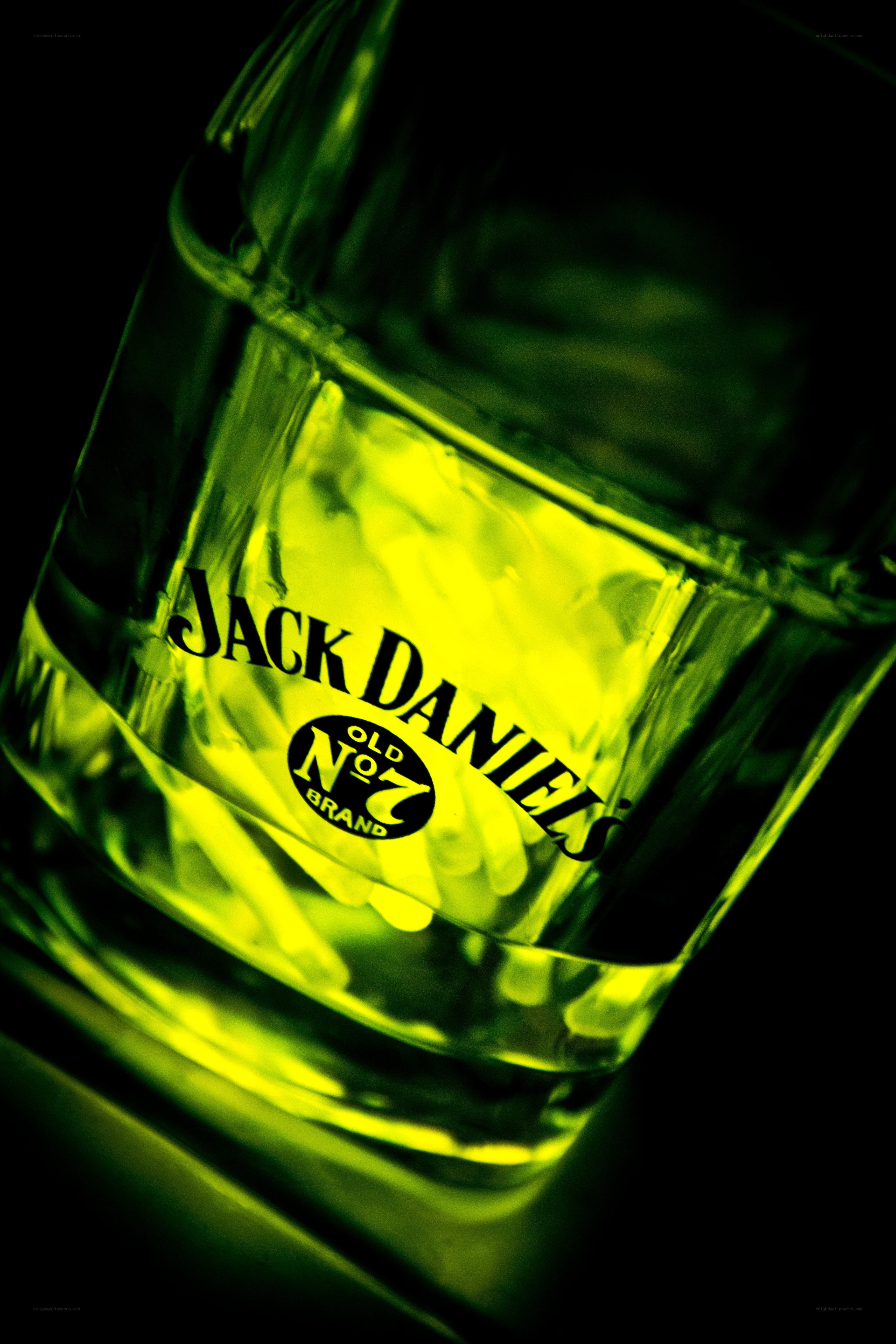 Jack Daniels glass with green light