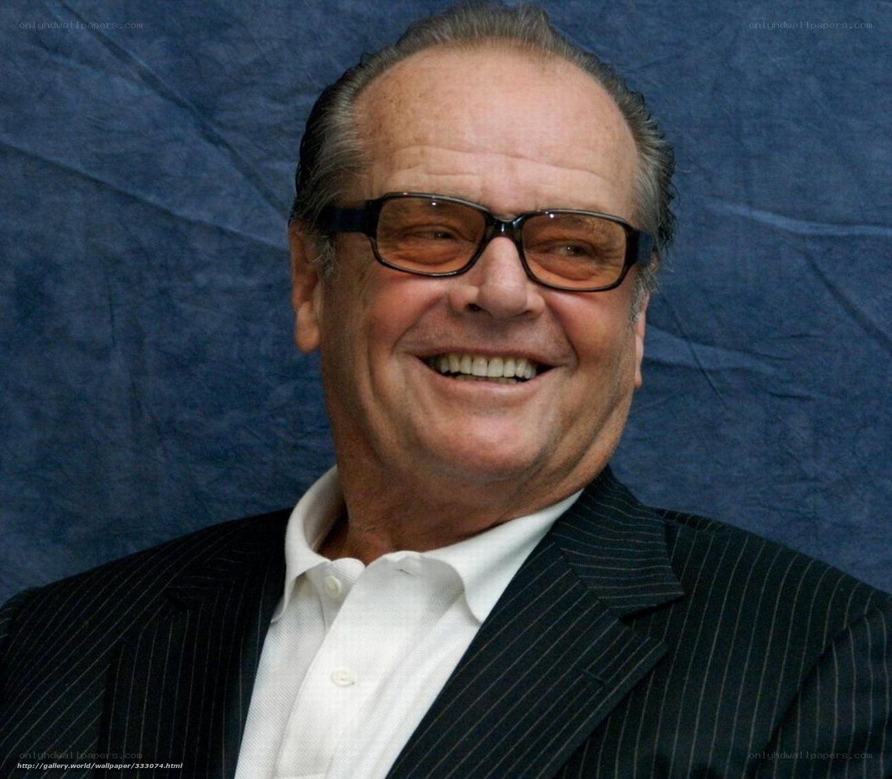 Jack Nicholson smiling in a suit