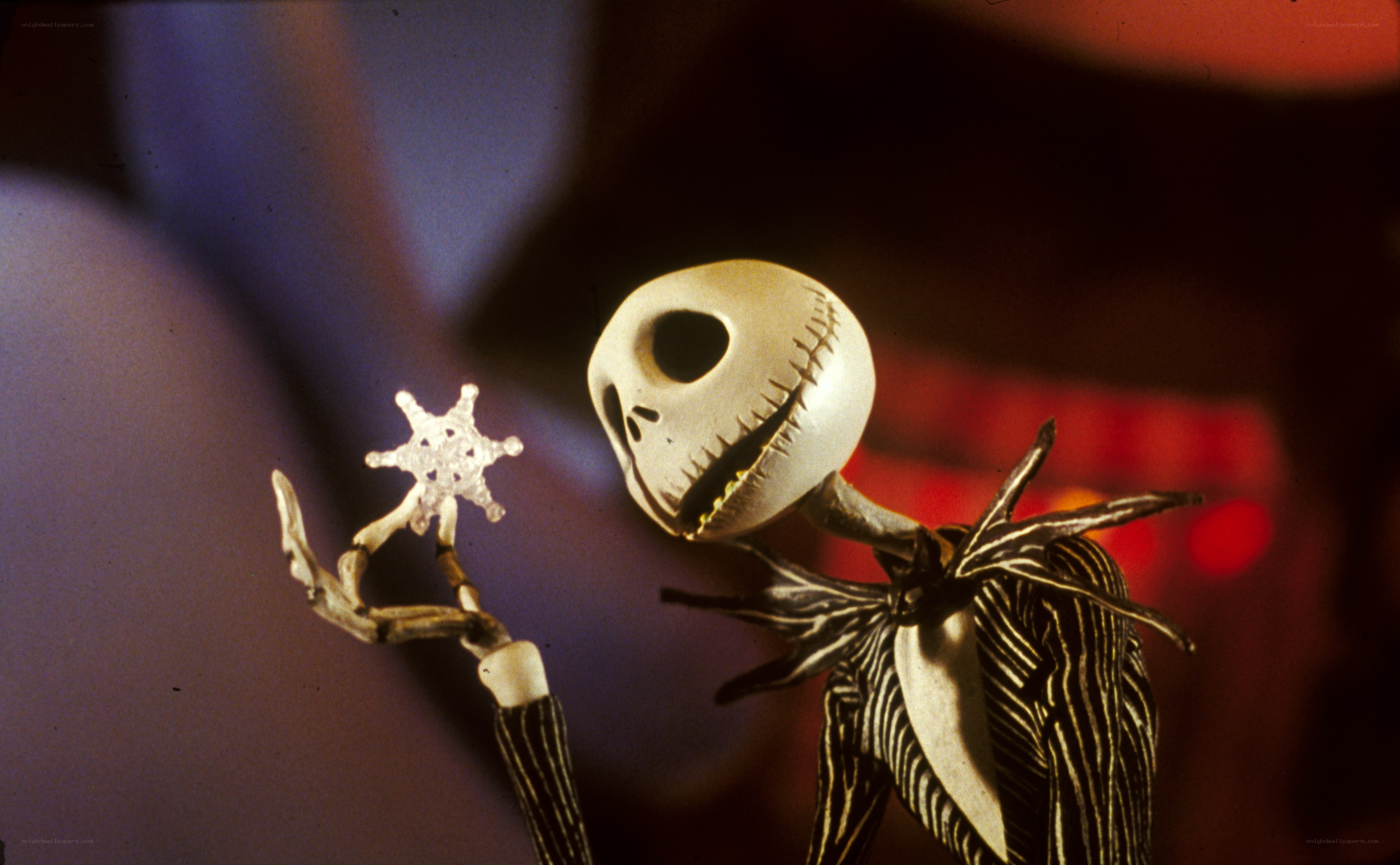 Jack Skellington holding a snowflake