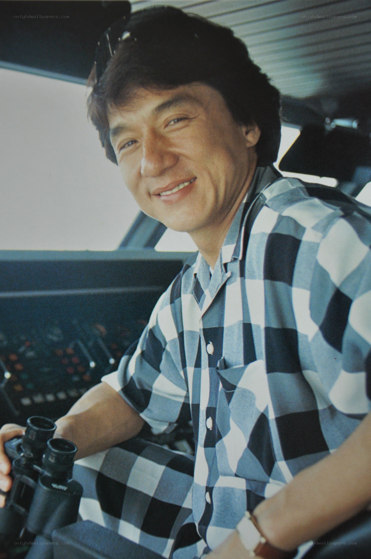 Jackie Chan in a car