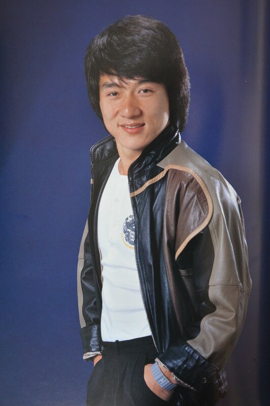 Jackie Chan in leather jacket