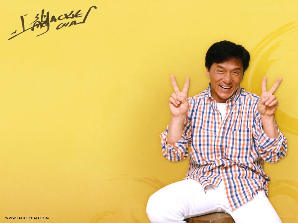 Jackie Chan making peace signs