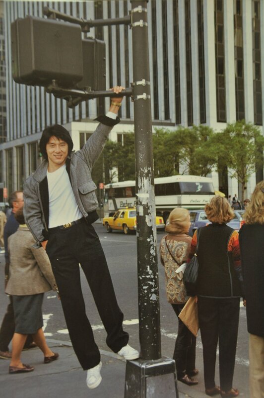 Jackie Chan on a city street