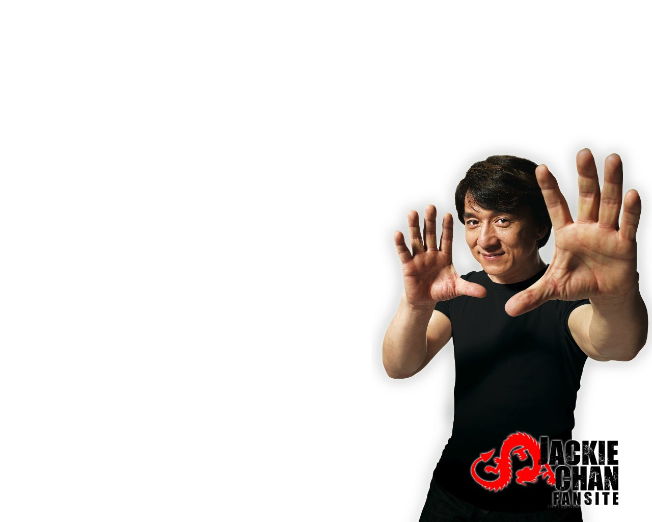 Jackie Chan posing with hands forward