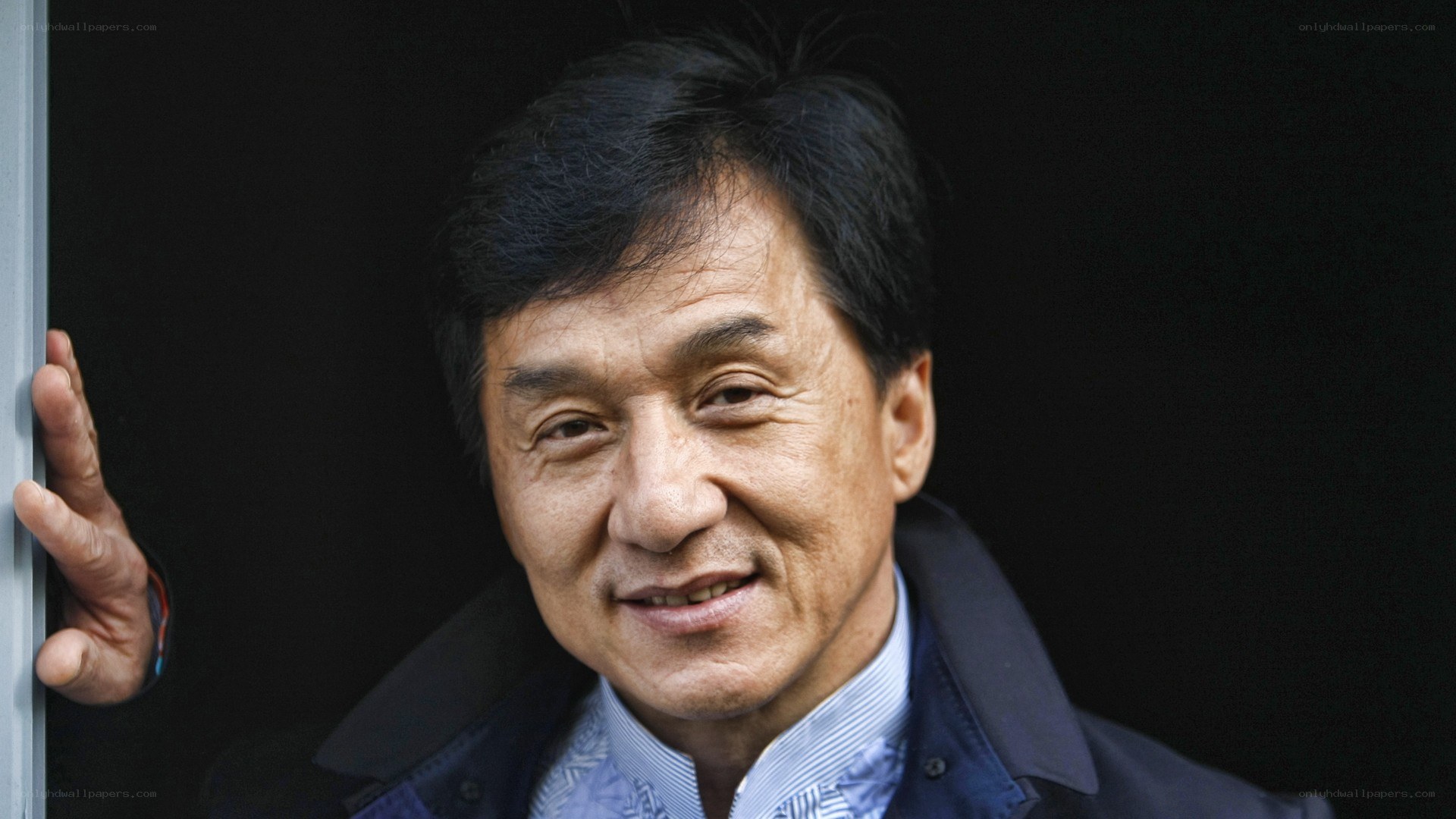Jackie Chan smiling at camera