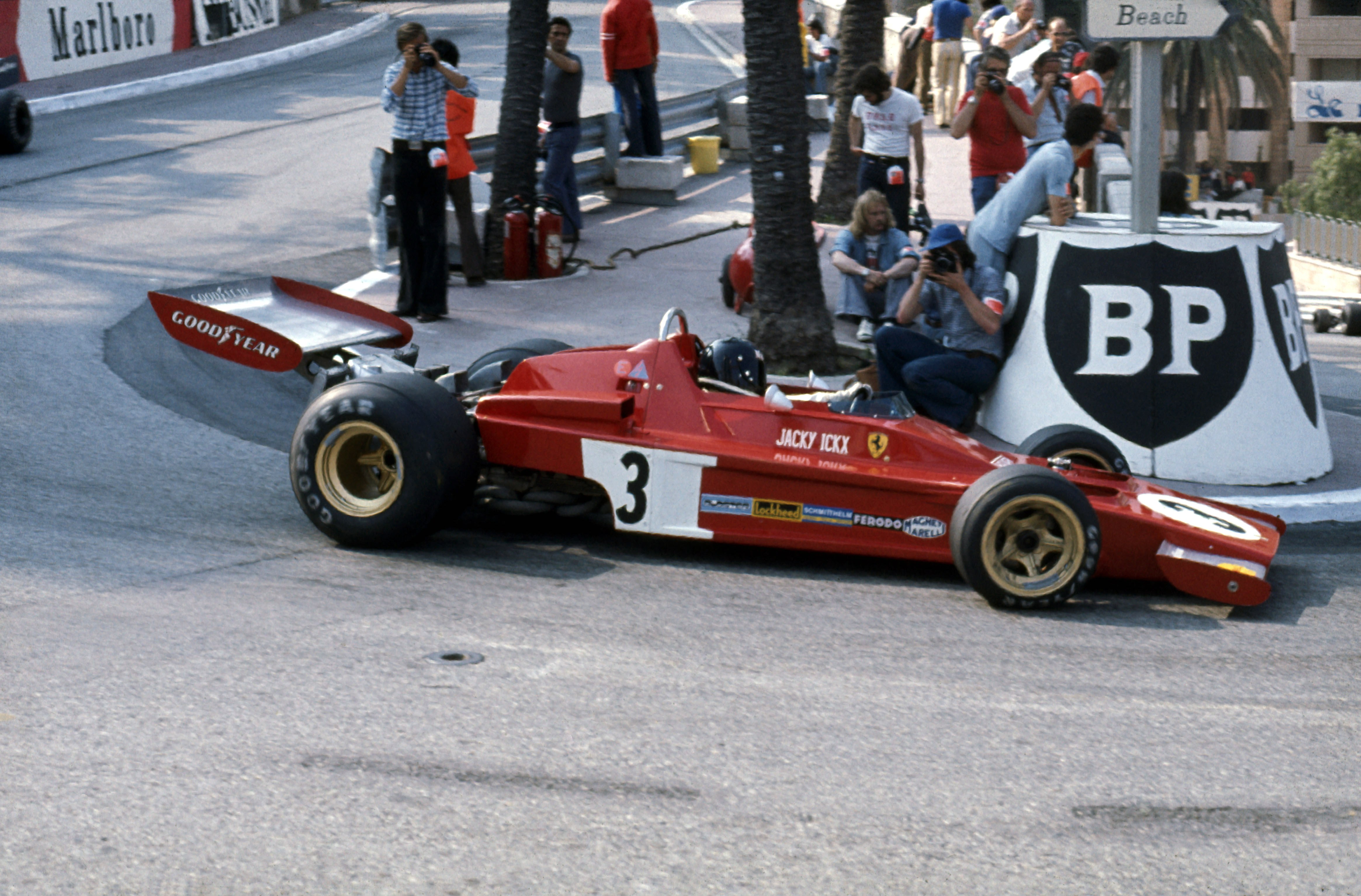 Jacky Ickx in a red Ferrari
