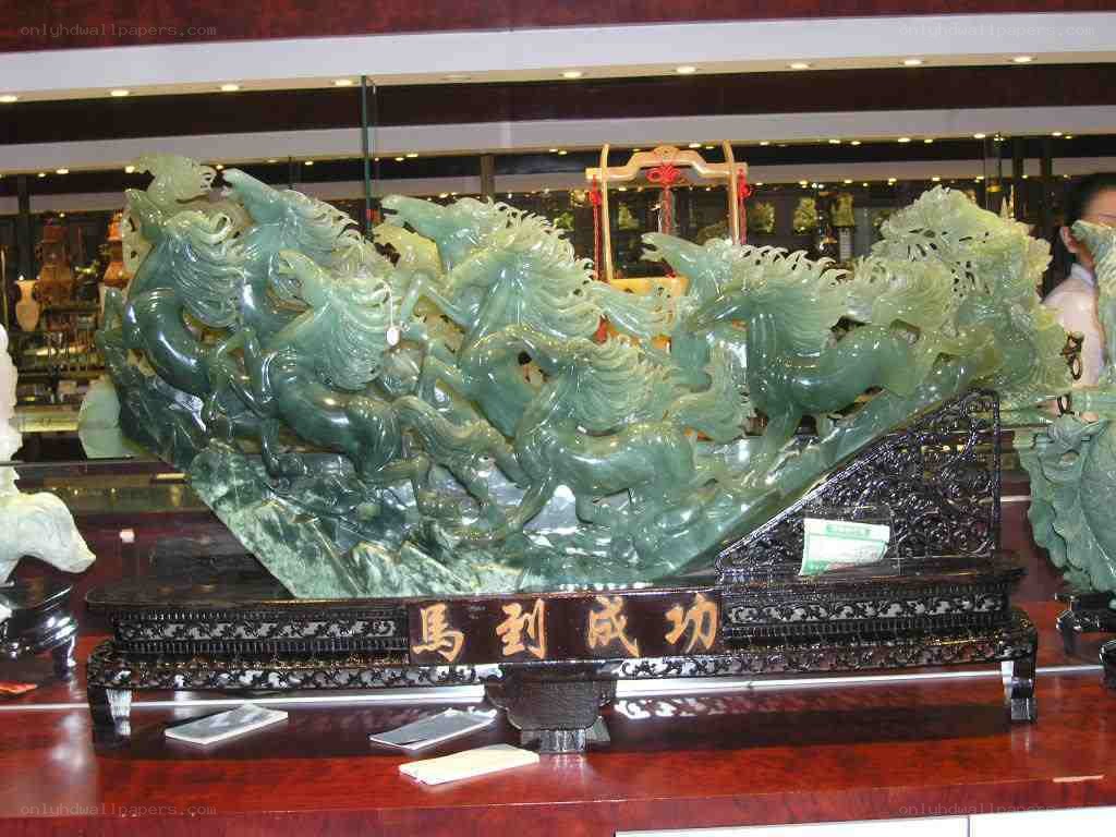 Jade horse sculpture display