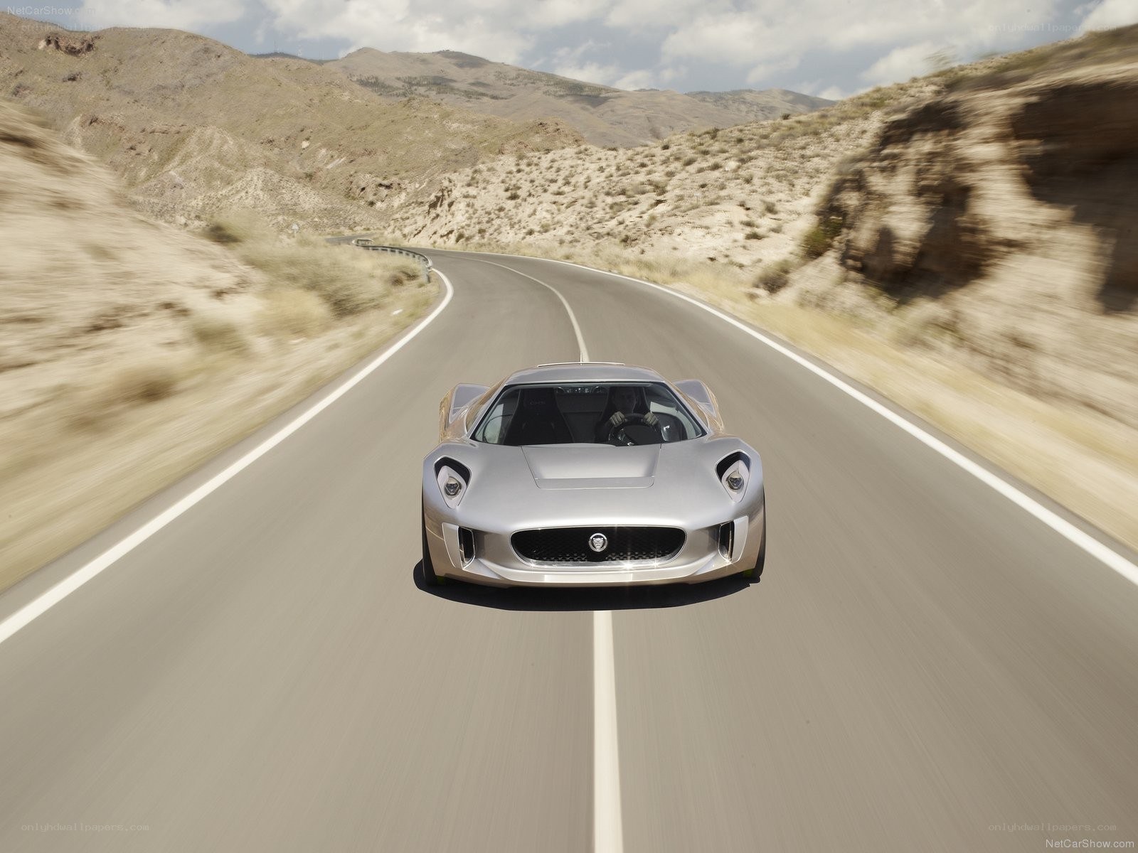 Jaguar C-X75 on a desert road