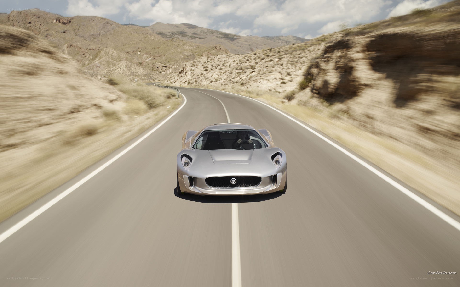 Jaguar C-X75 on desert road