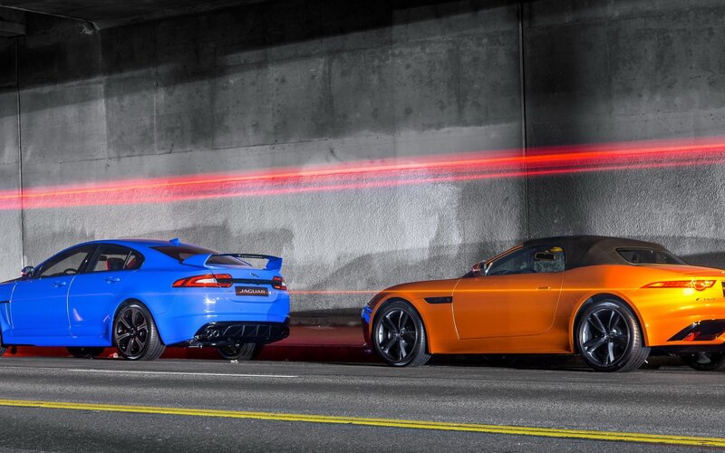 Jaguar cars in tunnel