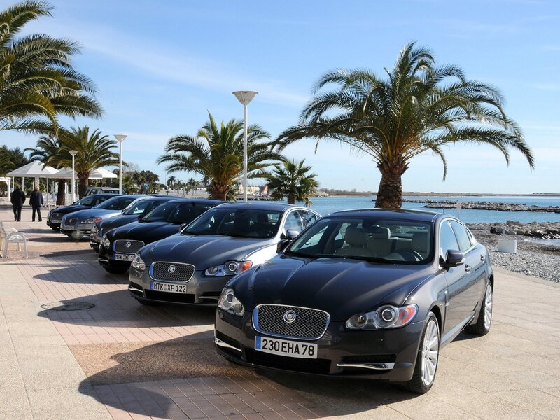 Jaguar cars on a seaside promenade
