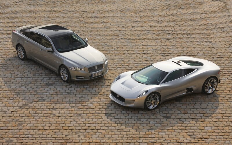 Jaguar cars on cobblestones