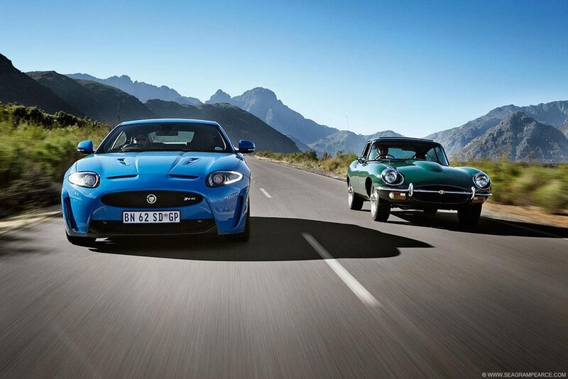 Jaguar cars on mountain road