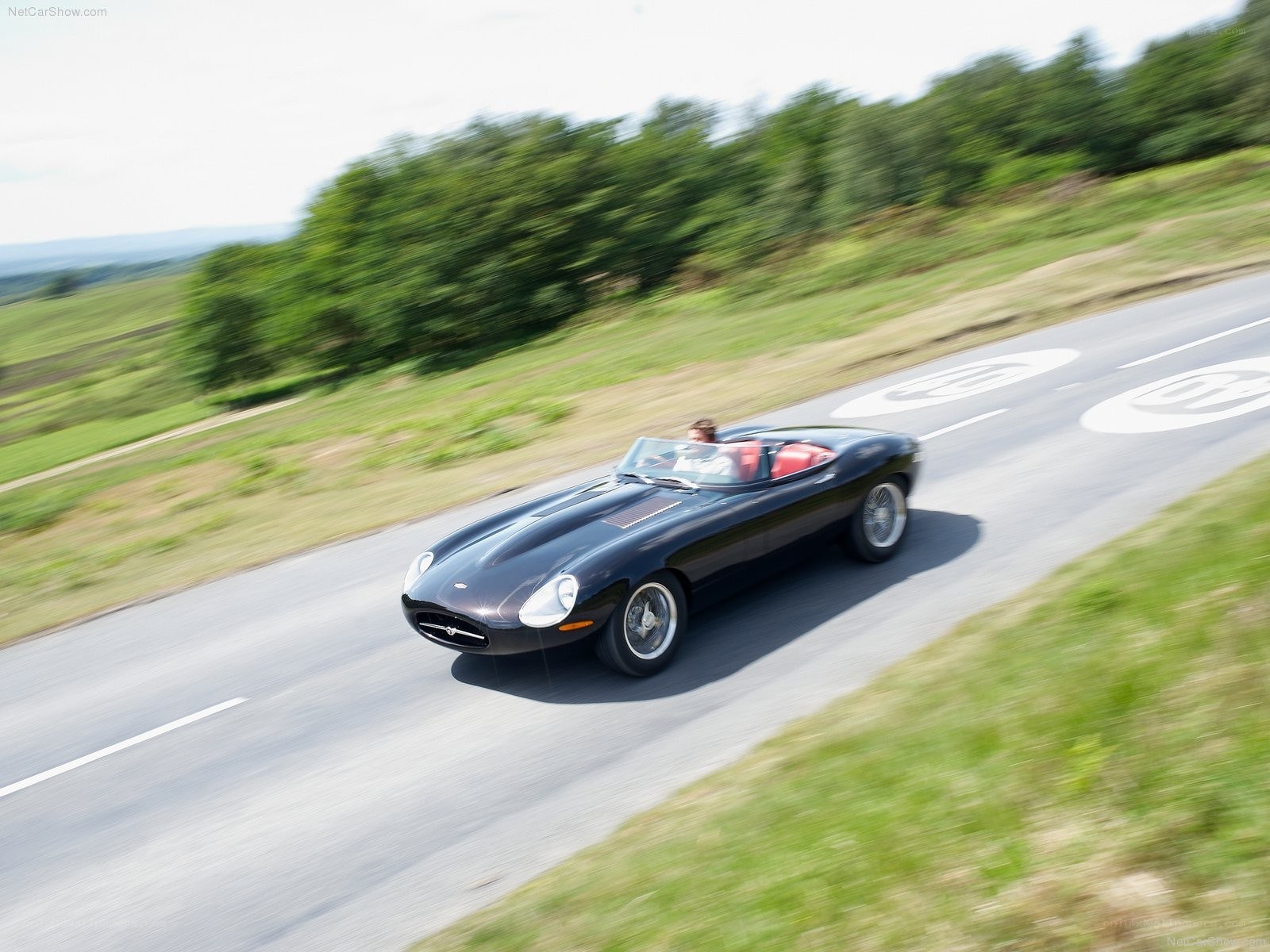 Jaguar E-Type on a country road